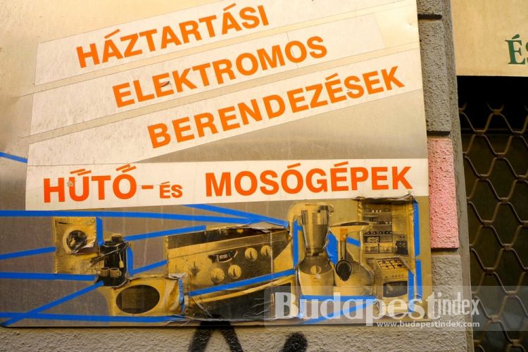 Budget and environmentally friendly signboard. Just paper clippings. Budapest Shop