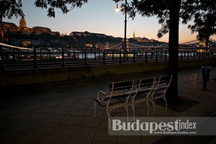 Lights of the Castle from the Danube Promenade on Pest side. Back in the days, these Buchwald chairs were rented for a fee, collected by uniformed women. Today, you can relax in their replicas for free watching the sun go down. Danube Promenade, Budapest